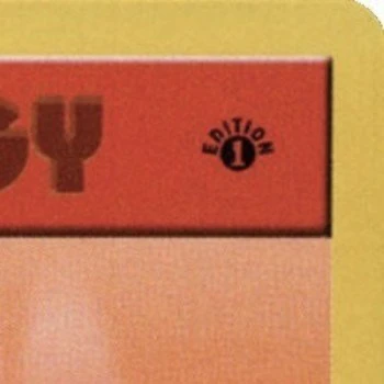 Pokemon First Edition -symbol som visas i det övre högra hörnet av energitypskort